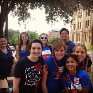 A few of us posing for a picture after handing out water and shirts in front of the capitol