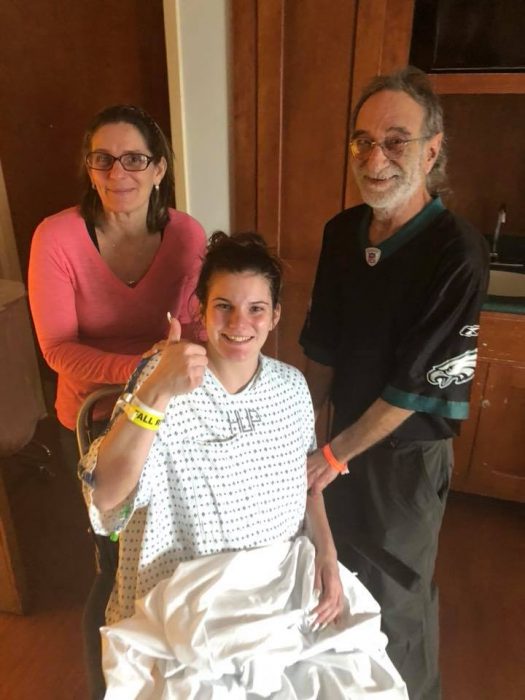 Dana Scatton with her parents shortly before her emergency C-section after she was diagnosed with a brain tumor.