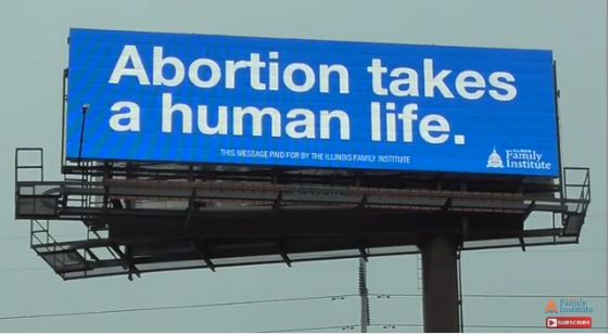 screenshot from video, billboard, abortion