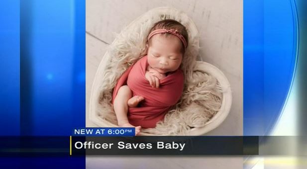 screenshot, officer saves baby