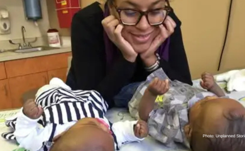 After resisting pressure to abort her twins, she now mentors single moms